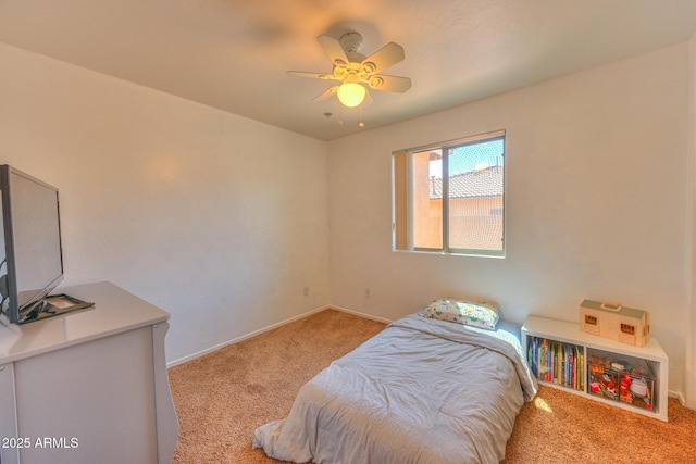 2386 Skyview Dr, Sierra Vista, AZ 85635 - carpeted bedroom featuring baseboards and a ceiling fan