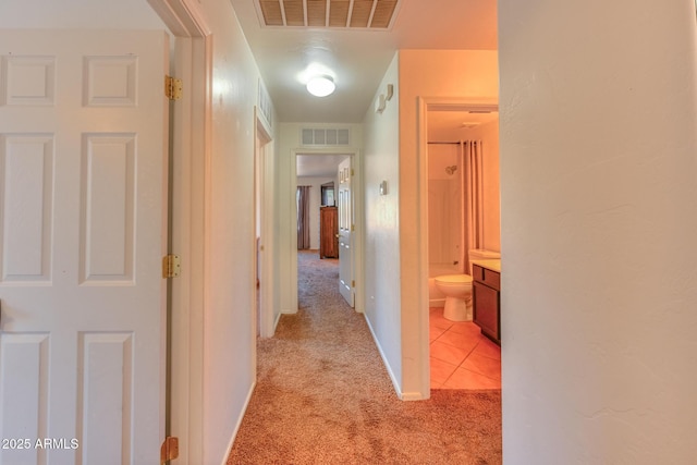 2386 Skyview Dr, Sierra Vista, AZ 85635 - corridor featuring light carpet and baseboards