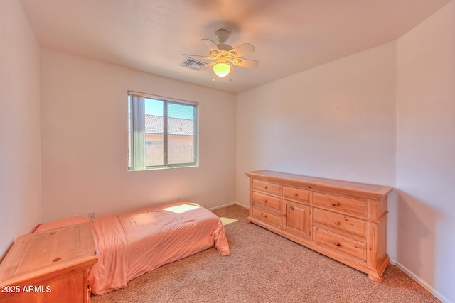 2386 Skyview Dr, Sierra Vista, AZ 85635 - bedroom featuring light carpet, ceiling fan, and baseboards