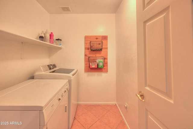 2386 Skyview Dr, Sierra Vista, AZ 85635 - washroom with separate washer and dryer, baseboards, and light tile patterned floors