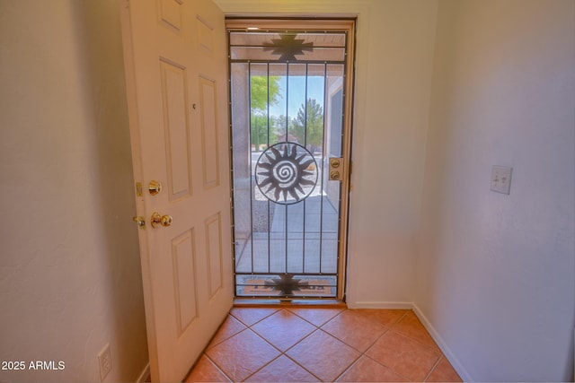 2386 Skyview Dr, Sierra Vista, AZ 85635 - entryway featuring light tile patterned floors and baseboards