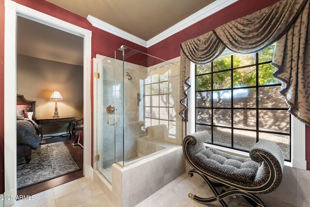 bathroom with walk in shower, tile patterned flooring, and crown molding