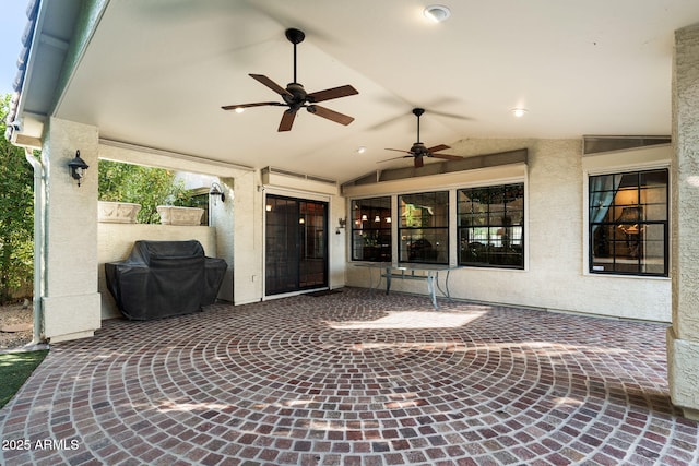 view of patio / terrace featuring ceiling fan