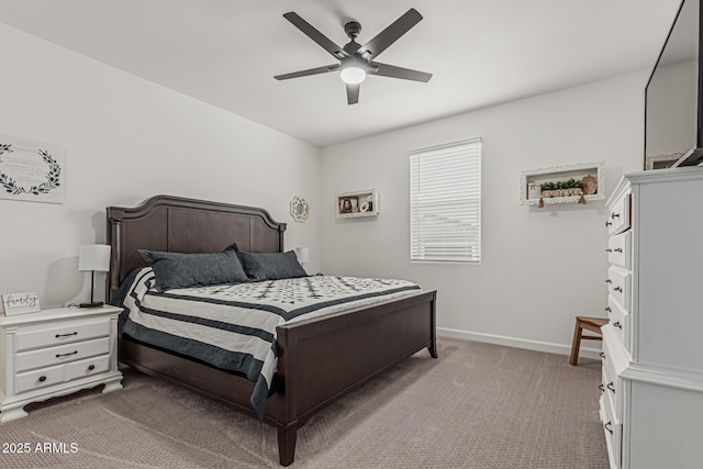 2923 W Shanley Ave, Apache Junction, AZ 85120 - bedroom with light colored carpet, baseboards, and ceiling fan