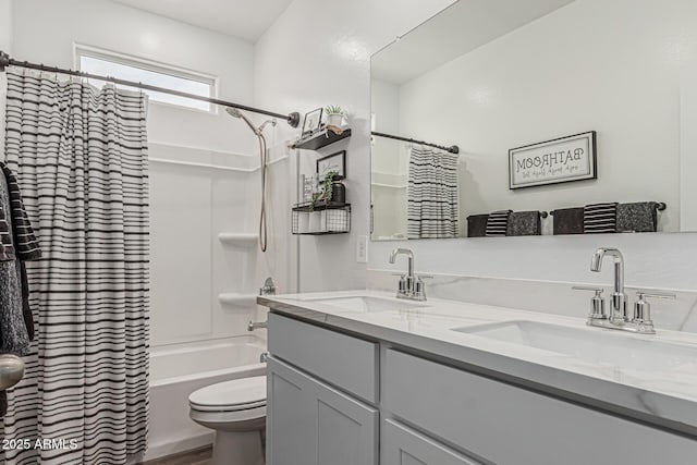 2923 W Shanley Ave, Apache Junction, AZ 85120 - bathroom with double vanity, a sink, shower / bath combo, and toilet