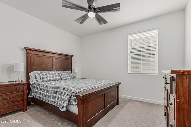 2923 W Shanley Ave, Apache Junction, AZ 85120 - bedroom with baseboards, ceiling fan, and light carpet