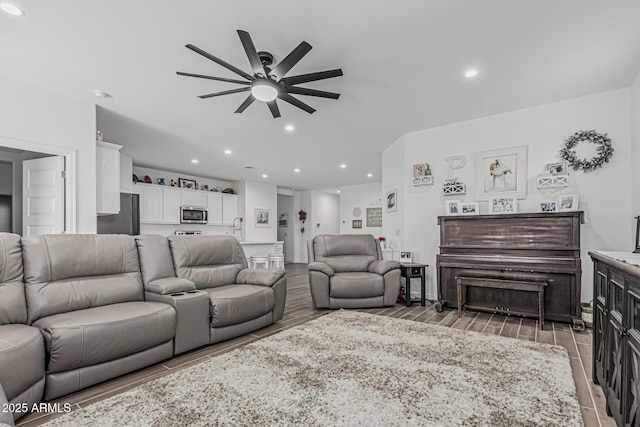 2923 W Shanley Ave, Apache Junction, AZ 85120 - living room featuring recessed lighting, ceiling fan, and wood finish floors