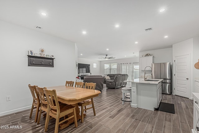 2923 W Shanley Ave, Apache Junction, AZ 85120 - dining space with recessed lighting, ceiling fan, dark wood-style floors, and visible vents