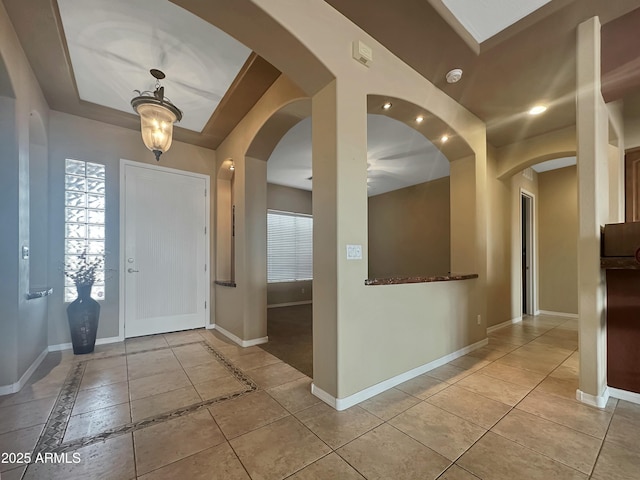 entrance foyer featuring light tile patterned floors