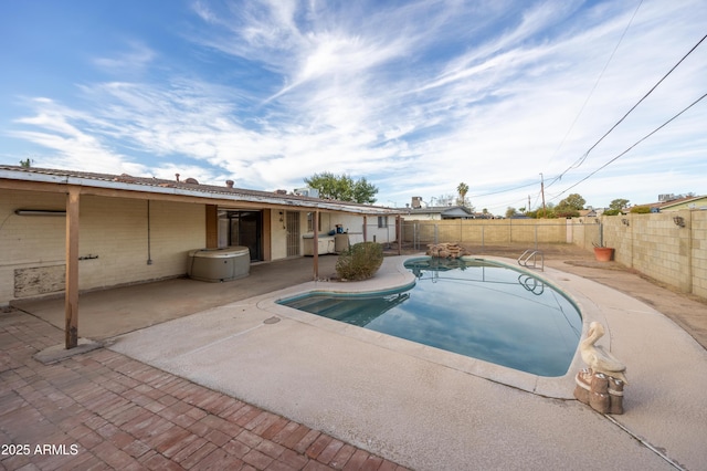 view of pool with a patio area