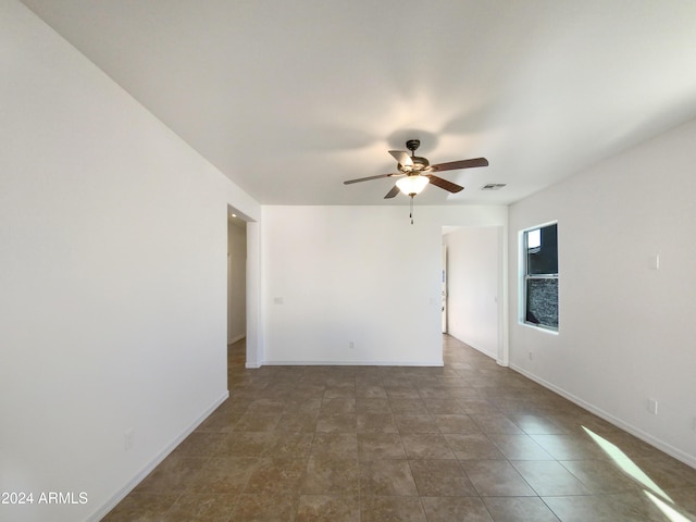 spare room featuring ceiling fan