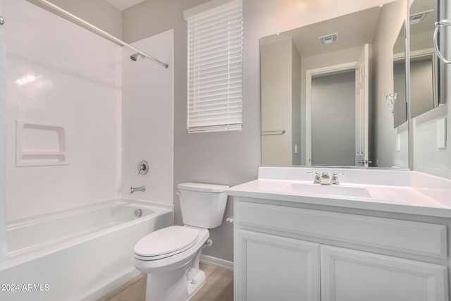 full bathroom featuring shower / tub combination, toilet, and vanity