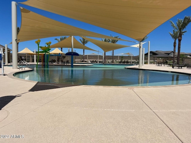 view of pool featuring a patio area