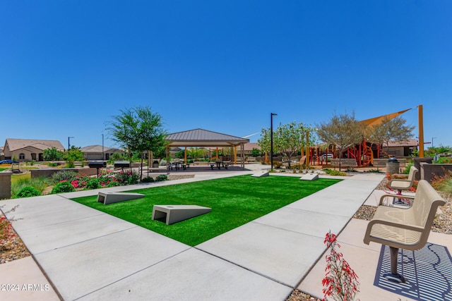 view of home's community with a gazebo and a lawn