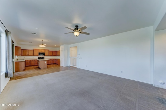 7398 W Paso Trl, Peoria, AZ 85383 - unfurnished living room with light colored carpet and ceiling fan