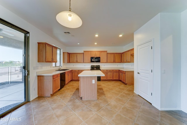 7398 W Paso Trl, Peoria, AZ 85383 - kitchen featuring black appliances, light countertops, a center island, recessed lighting, and light tile patterned floors