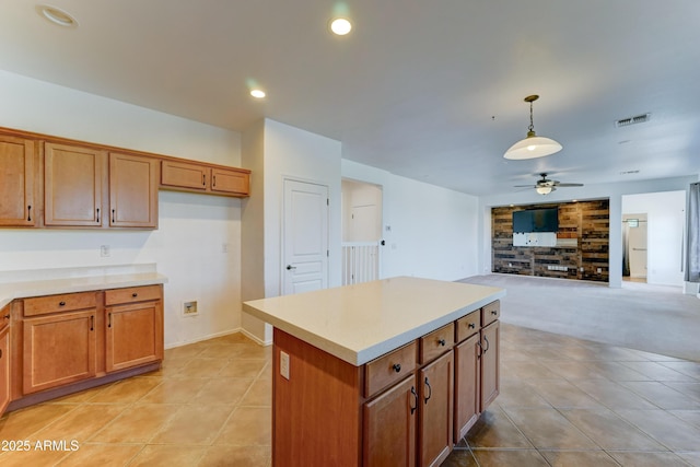 7398 W Paso Trl, Peoria, AZ 85383 - kitchen with ceiling fan, brown cabinets, light tile patterned flooring, pendant lighting, and recessed lighting