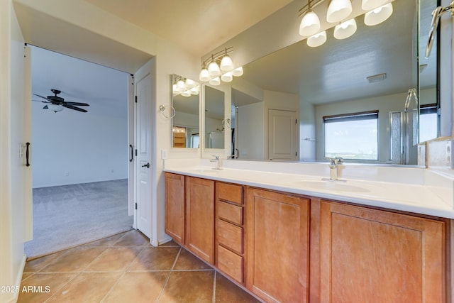 7398 W Paso Trl, Peoria, AZ 85383 - full bath with double vanity, a ceiling fan, and tile patterned floors