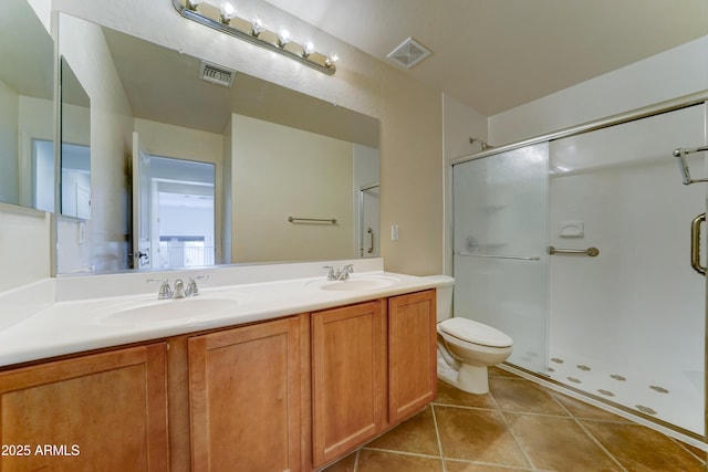 7398 W Paso Trl, Peoria, AZ 85383 - bathroom with double vanity, a shower stall, and tile patterned flooring