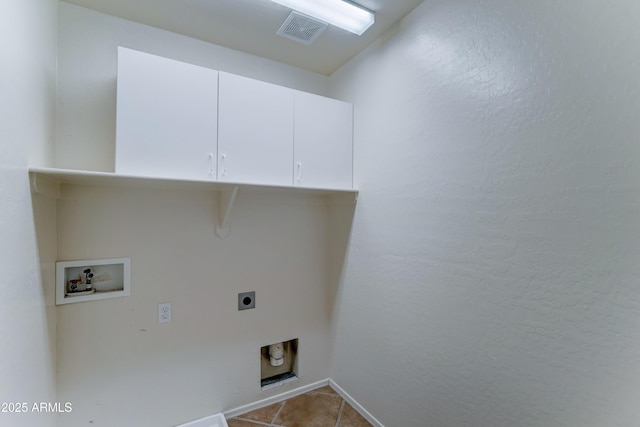 7398 W Paso Trl, Peoria, AZ 85383 - washroom with hookup for an electric dryer, cabinet space, washer hookup, and tile patterned floors