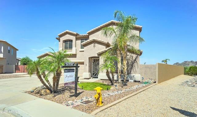 7398 W Paso Trl, Peoria, AZ 85383 - mediterranean / spanish-style house with stucco siding, concrete driveway, and a tile roof