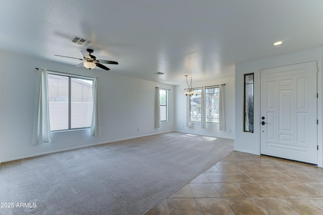 7398 W Paso Trl, Peoria, AZ 85383 - foyer featuring light colored carpet, a ceiling fan, light tile patterned flooring, recessed lighting, and a chandelier