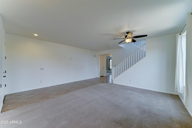 7398 W Paso Trl, Peoria, AZ 85383 - unfurnished room featuring stairs, ceiling fan, carpet flooring, recessed lighting, and tile patterned flooring