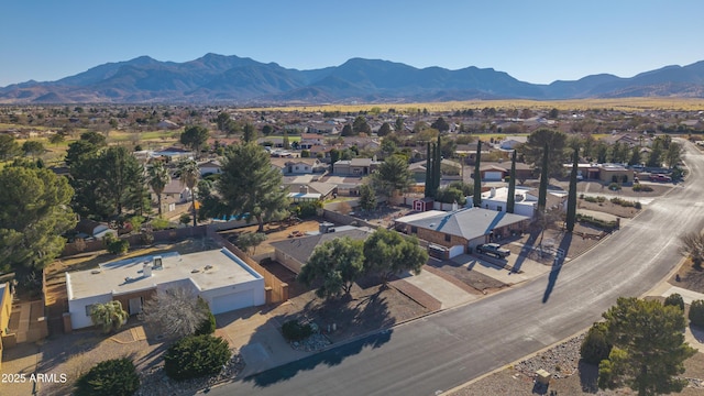 birds eye view of property featuring a mountain view and a residential view