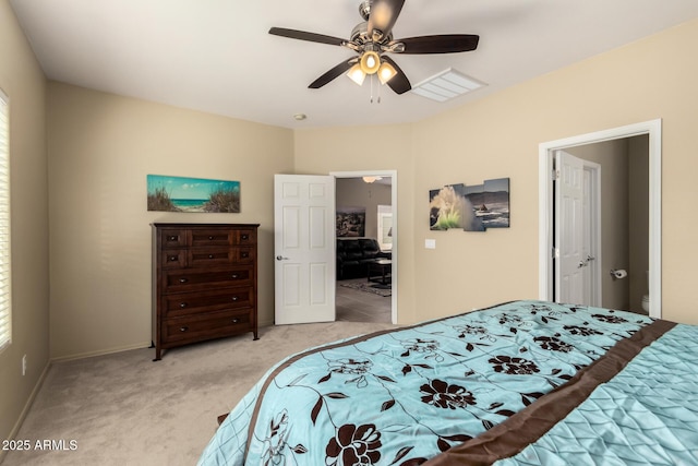 carpeted bedroom with ceiling fan