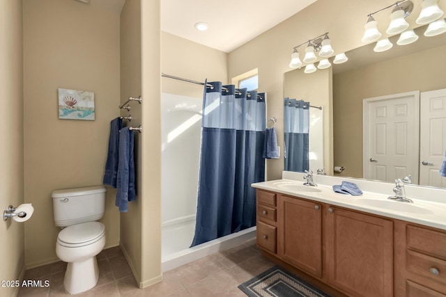 bathroom featuring vanity, toilet, tile patterned floors, and a shower with shower curtain