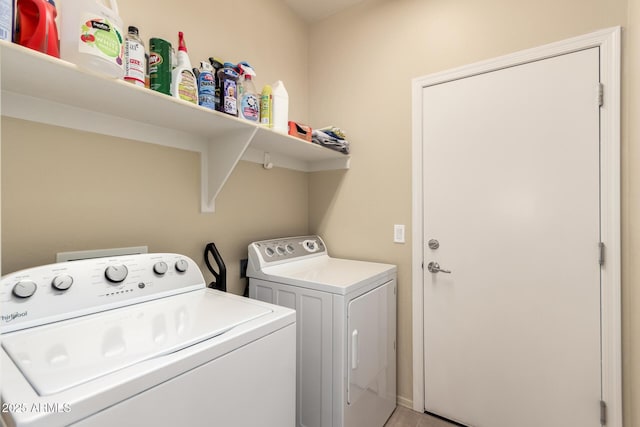 laundry room with washer and dryer