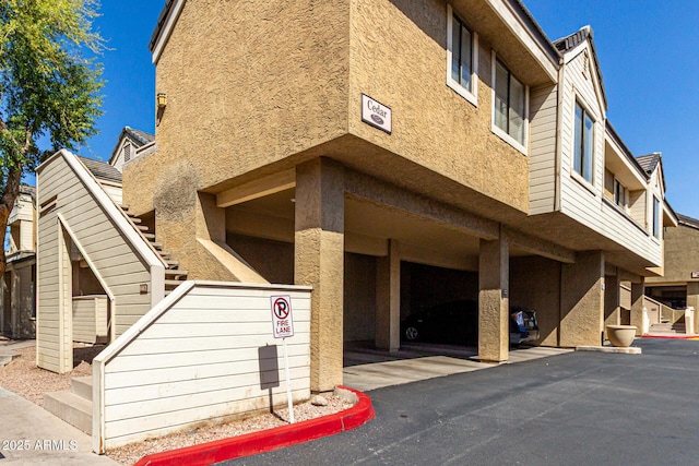 view of property with stairway