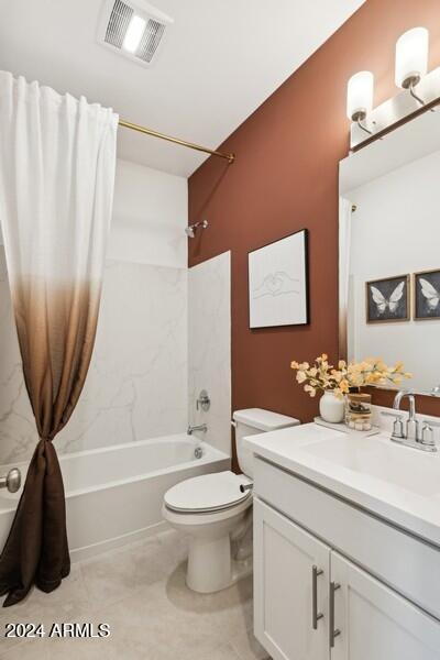 full bathroom featuring vanity, shower / bath combo, and toilet