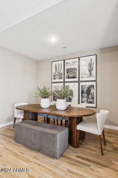 dining room featuring light hardwood / wood-style floors