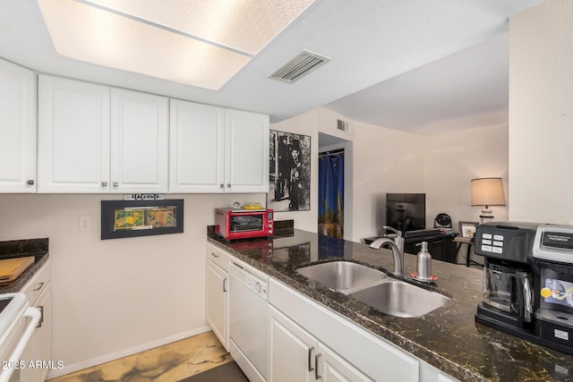 1916 W Morningside Dr Unit 108, Phoenix, AZ 85023 - kitchen with white dishwasher, a sink, range, white cabinetry, and visible vents