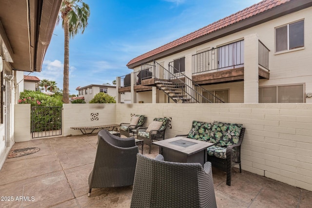 1916 W Morningside Dr Unit 108, Phoenix, AZ 85023 - view of patio / terrace featuring fence, outdoor lounge area, and stairs