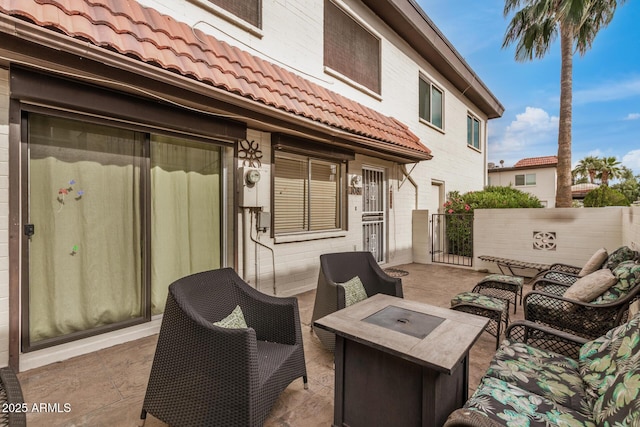 1916 W Morningside Dr Unit 108, Phoenix, AZ 85023 - view of patio / terrace with fence and an outdoor living space with a fire pit