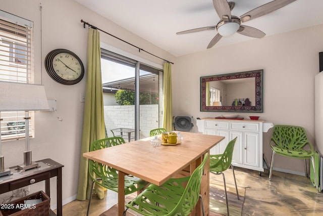 1916 W Morningside Dr Unit 108, Phoenix, AZ 85023 - dining room featuring plenty of natural light, a ceiling fan, and baseboards