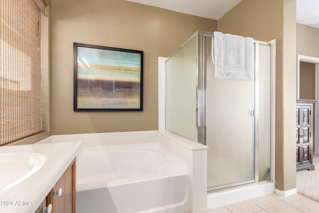 bathroom with vanity, tile patterned floors, and separate shower and tub