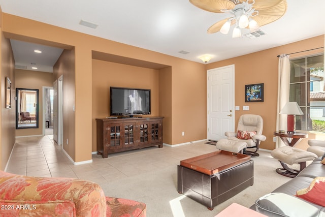 living room with light tile patterned flooring and ceiling fan