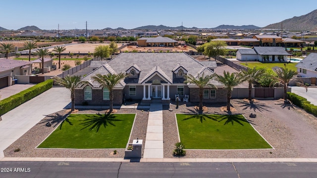 view of front of home with a mountain view