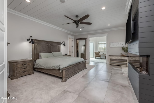 bedroom with ceiling fan and ornamental molding