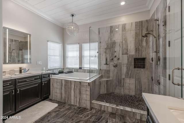 bathroom featuring vanity, independent shower and bath, and an inviting chandelier