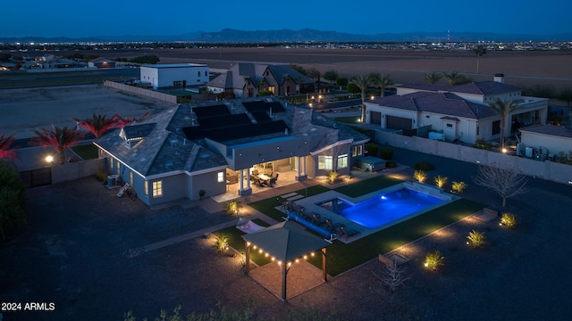 aerial view at twilight with a mountain view