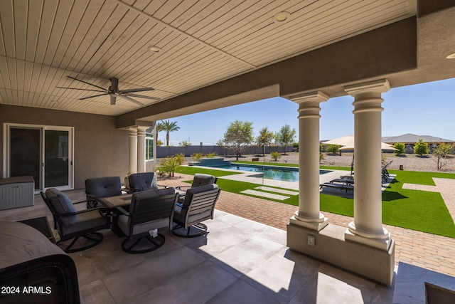 view of patio with ceiling fan