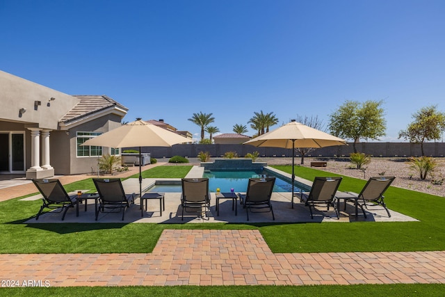 view of patio featuring a fenced in pool