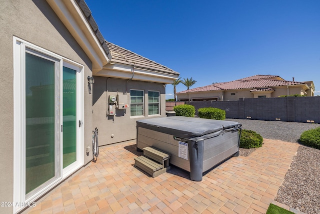 view of patio featuring a hot tub