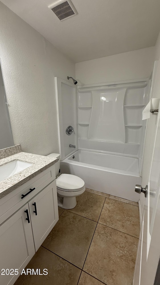 4217 W Medlock Dr, Phoenix, AZ 85019 - bathroom with vanity, shower / washtub combination, and tile patterned floors