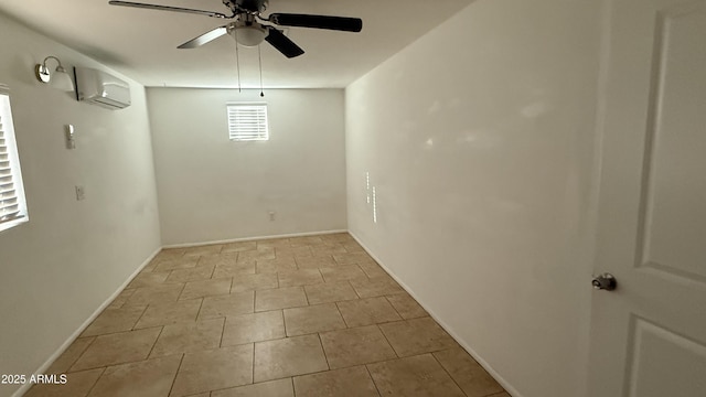 4217 W Medlock Dr, Phoenix, AZ 85019 - unfurnished room featuring a wall mounted AC, a ceiling fan, and tile patterned flooring