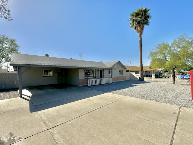 3637 W Myrtle Ave, Phoenix, AZ 85051 - ranch-style home featuring a carport, covered porch, and concrete driveway